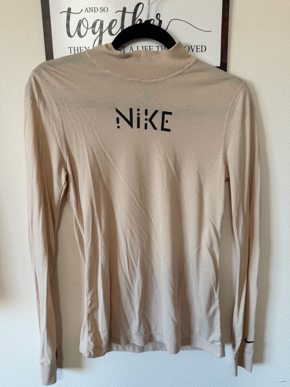 Nike Beige Crewneck Tee with Black Swoosh Accent